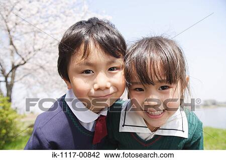 Two Japanese children smiling and grimacing View Large Photo Image Stock Image - Two Japanese children smiling and grimacing. Fotosearch