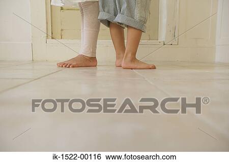 Two Pairs of Legs Standing Back to Back View Large Photo Image Stock Photograph - Two Pairs of Legs Standing Back to Back. Fotosearch