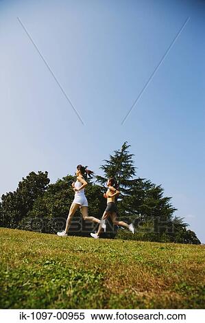 Two Young Women Jogging View Large Photo Image Stock Photography - Two Young Women Jogging. Fotosearch