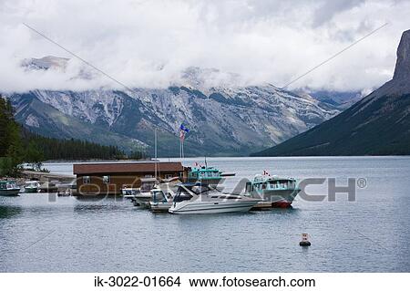 View of Mountain and Lake in Banff, Alberta, Canada View Large Photo Image Picture - View of Mountain and Lake in Banff, Alberta, Canada. Fotosearch