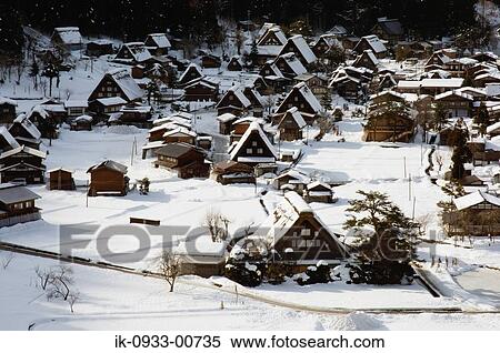Stock Photography - View of Snow Covered Houses in Shirakawa, Village . Fotosearch