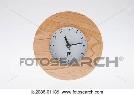 Stock Photography - Wall Clock on White Background. Fotosearch