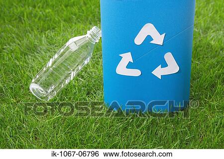 Stock Photograph - Water Bottle and Recycle Bin. Fotosearch