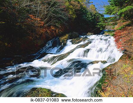 Water flowing over mossy rocks View Large Photo Image Stock Image - Water flowing over mossy rocks. Fotosearch