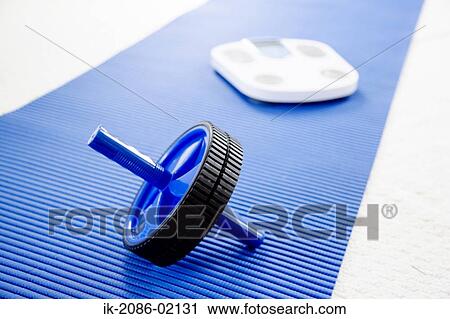 Weighing machine with barbells on floor mat View Large Photo Image Stock Image - Weighing machine with barbells on floor mat. Fotosearch