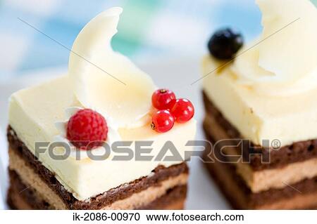 Stock Image - White Chocolate Cake with Raspberry. Fotosearch