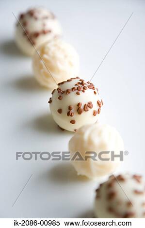 Stock Photography - White Chocolates of Heart Shape. Fotosearch