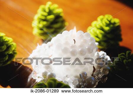 Stock Photo - White Pearl Candles. Fotosearch