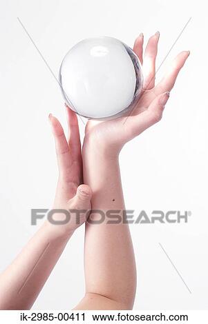 Stock Image - Woman Hands Holding Ball. Fotosearch