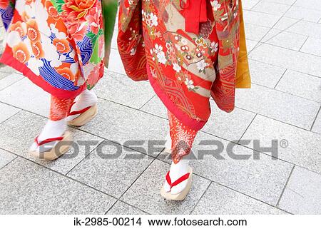 Picture - Women Wearing Tabi and Walking. Fotosearch