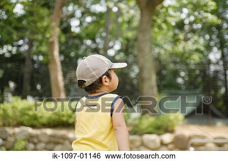 Stock Photograph - Young Boy. Fotosearch