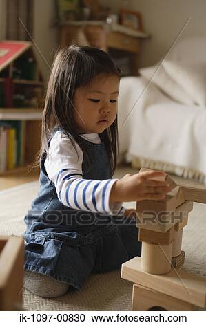 Young Girl Stacking Blocks View Large Photo Image Stock Image - Young Girl Stacking Blocks. Fotosearch