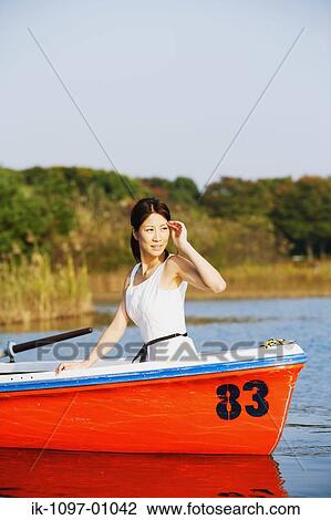 Young Woman in Boat View Large Photo Image Stock Image - Young Woman in Boat. Fotosearch