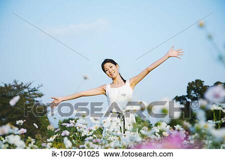 Stock Photography - Young Woman in Summer Dress. Fotosearch