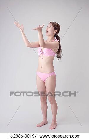 Young Woman in Swimsuit View Large Photo Image Stock Photo - Young Woman in Swimsuit. Fotosearch
