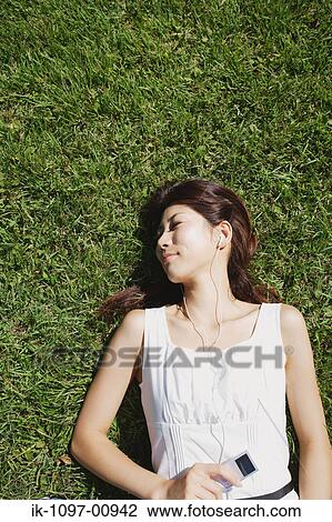 Stock Image - Young Woman Sleeping. Fotosearch