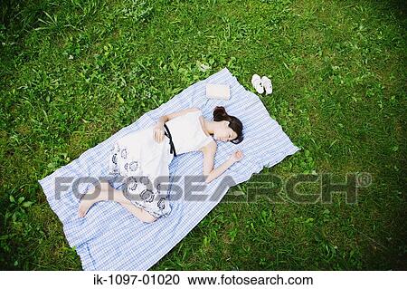 Stock Image - Young Woman Sleeping. Fotosearch