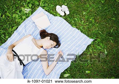 Stock Image - Young Woman Sleeping. Fotosearch
