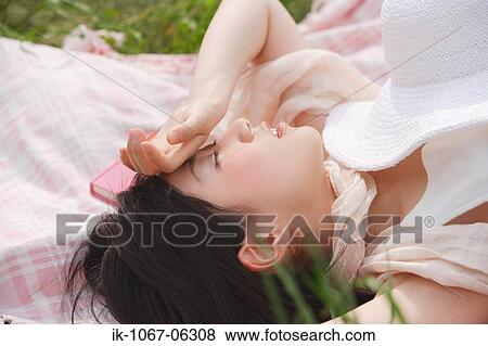 Stock Photo - Young woman sleeping . Fotosearch