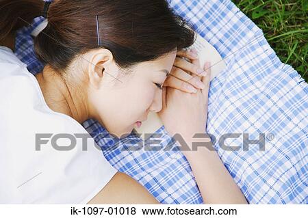 Stock Photo - Young Woman Sleeping. Fotosearch