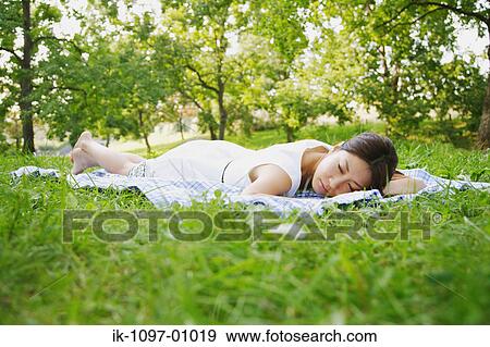 Stock Photo - Young Woman Sleeping. Fotosearch