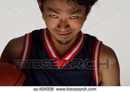 Asian Basketball Player Making a Scary Face View Large Photo Image Stock Photograph - Asian Basketball Player Making a Scary Face. Fotosearch