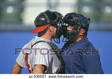 Stock Image - Baseball Catcher and Umpire Arguing. Fotosearch