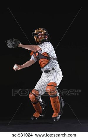 Picture - Baseball player throwing ball. Fotosearch