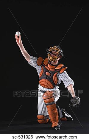 Baseball player throwing ball View Large Photo Image Stock Photograph - Baseball player throwing ball. Fotosearch