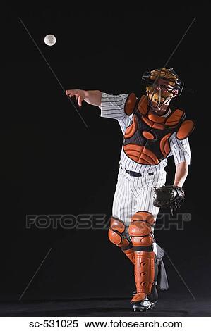 Baseball player throwing ball View Large Photo Image Stock Photography - Baseball player throwing ball. Fotosearch
