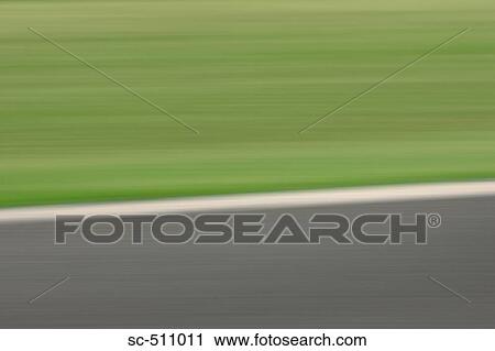 Blurred image of race track View Large Photo Image Stock Image - Blurred image of race track. Fotosearch