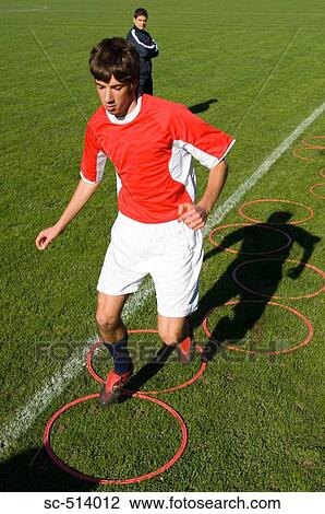 Boy doing soccer drills View Large Photo Image Stock Image - Boy doing soccer drills. Fotosearch