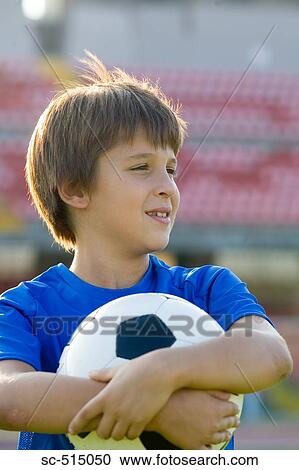 Stock Image - Boy looking onward. Fotosearch