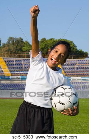 Boy punching the air View Large Photo Image Stock Image - Boy punching the air. Fotosearch