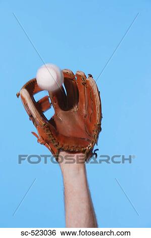 Stock Photograph - Catcher Catching a Baseball. Fotosearch