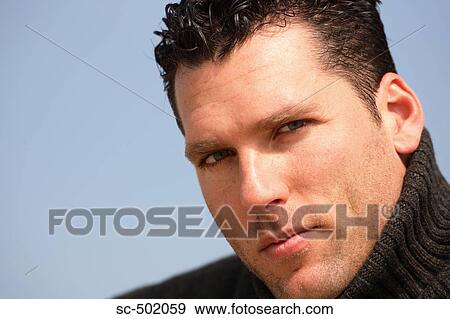 Caucasian male looking at camera View Large Photo Image Stock Photo - Caucasian male looking at camera. Fotosearch