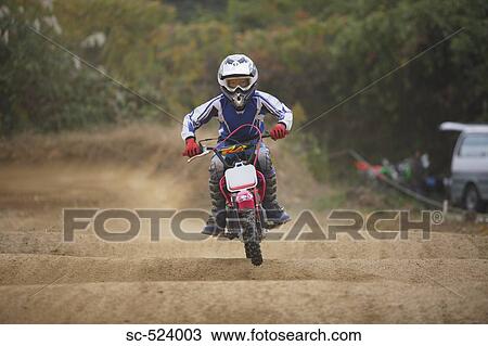 Dirtbiking over Mounds View Large Photo Image Stock Image - Dirtbiking over Mounds. Fotosearch