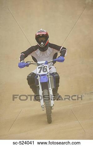 Dirtbiking over Mounds View Large Photo Image Stock Image - Dirtbiking over Mounds. Fotosearch