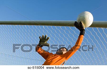 Picture - Diving one handed save. Fotosearch