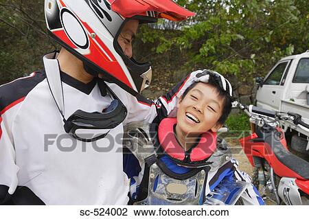 Father and Son Motocross Riders View Large Photo Image Stock Image - Father and Son Motocross Riders. Fotosearch