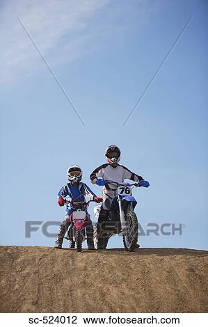Father and Son Motocross Riders View Large Photo Image Stock Image - Father and Son Motocross Riders. Fotosearch