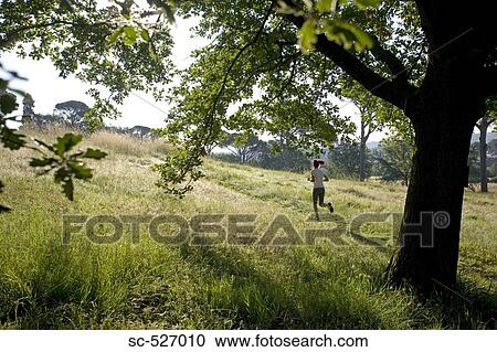 Girl jogging in countryside View Large Photo Image Stock Image - Girl jogging in countryside. Fotosearch
