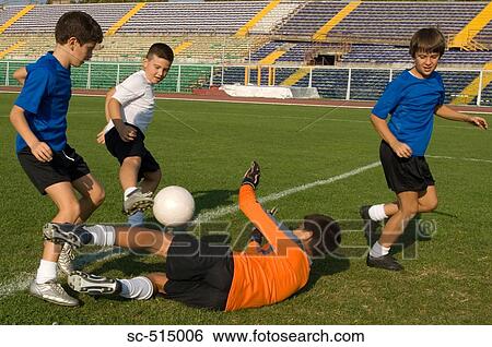 Goal keeper smothering the ball View Large Photo Image Stock Photograph - Goal keeper smothering the ball. Fotosearch