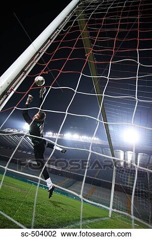Stock Image - Goalkeeper Making a Save. Fotosearch