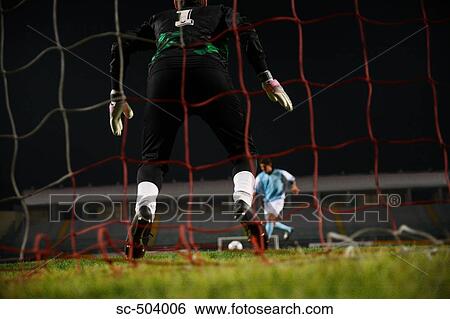 Stock Photograph - Goalkeeper Making a Save. Fotosearch