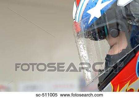 Head view of racing motor biker in helmet View Large Photo Image Stock Photography - Head view of racing motor biker in helmet. Fotosearch