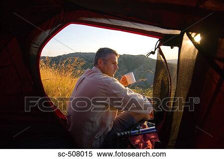 Hiker and tent View Large Photo Image Stock Photography - Hiker and tent. Fotosearch