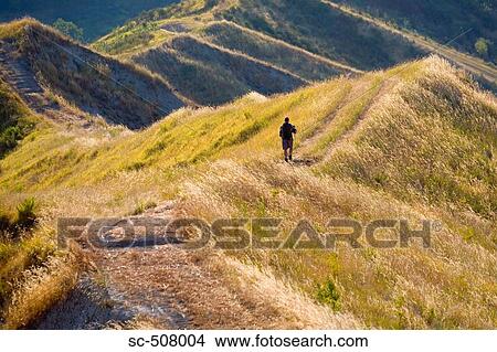 Picture - Hiker on path. Fotosearch
