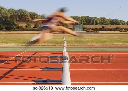 Hurdlers Hurdling Hurdles View Large Photo Image Stock Photo - Hurdlers Hurdling Hurdles. Fotosearch