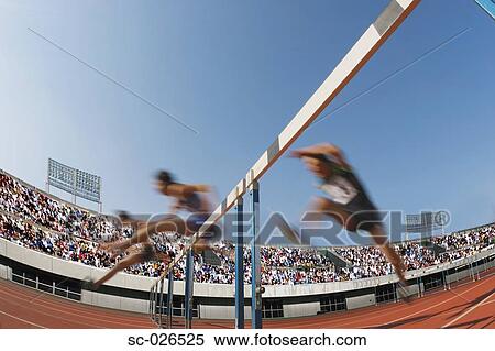 Hurdlers Hurdling Hurdles View Large Photo Image Stock Photography - Hurdlers Hurdling Hurdles. Fotosearch